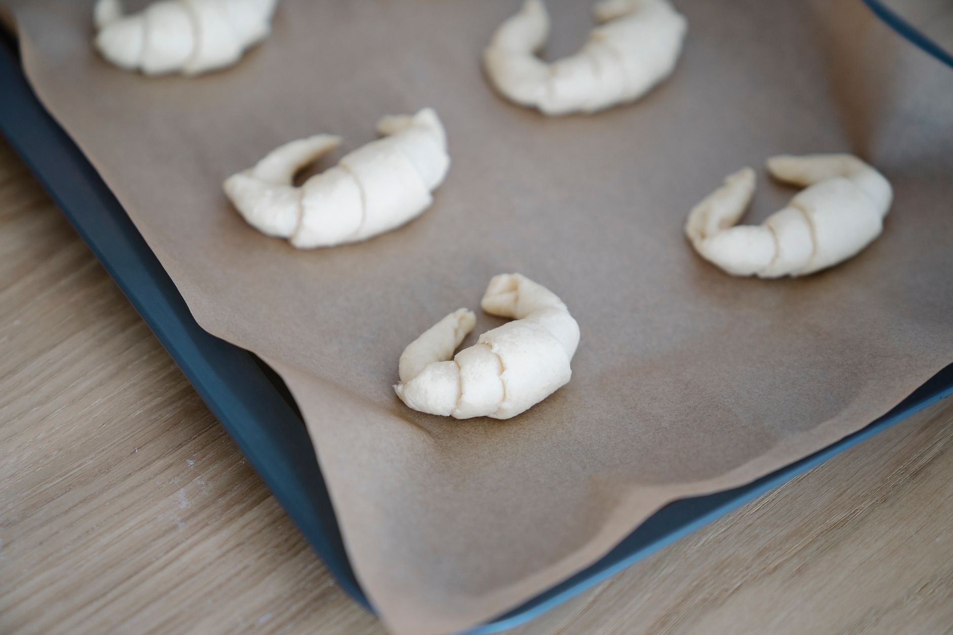 Golden croissants on bakery paper